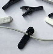 Cord Clamp
(How To keep Earbuds in while running)